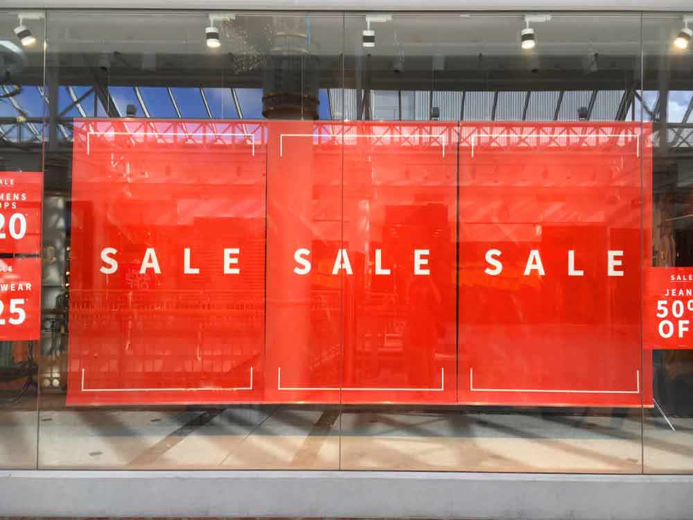 Large Sale Banner On The Store Window